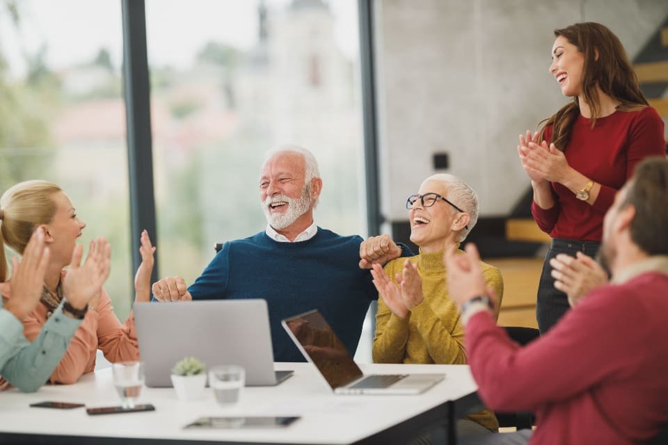 A small team talking in an office