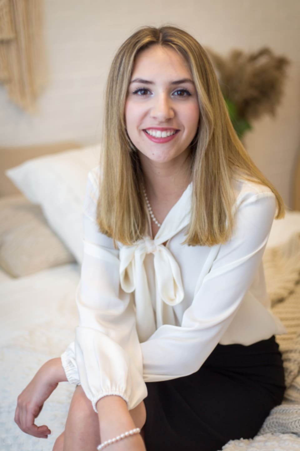 Consultant smiling in her office