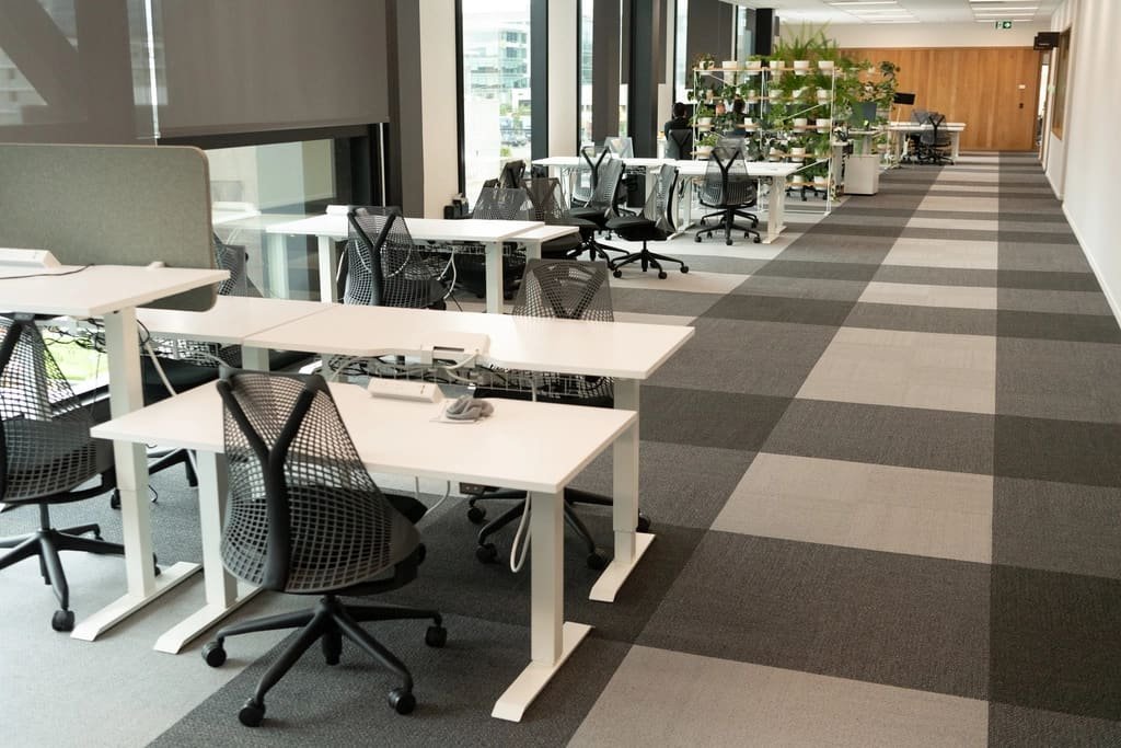 The office with desks and plants